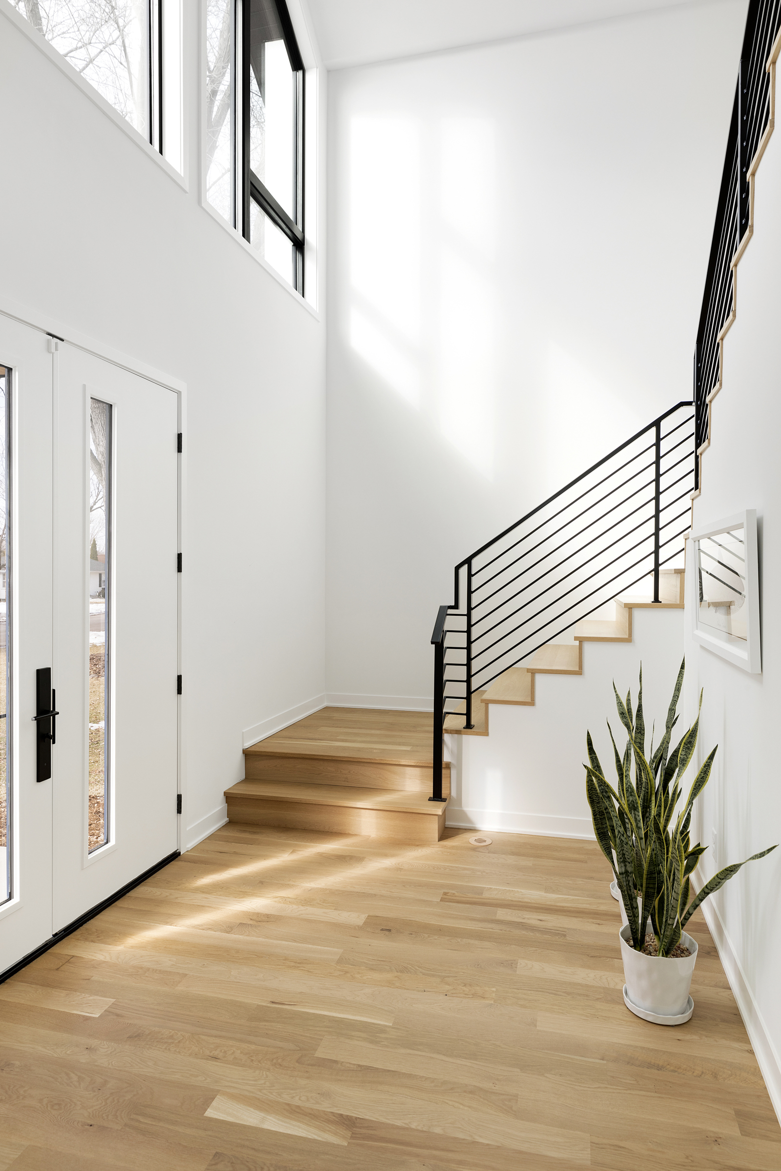 Door entrance leading to a staircase