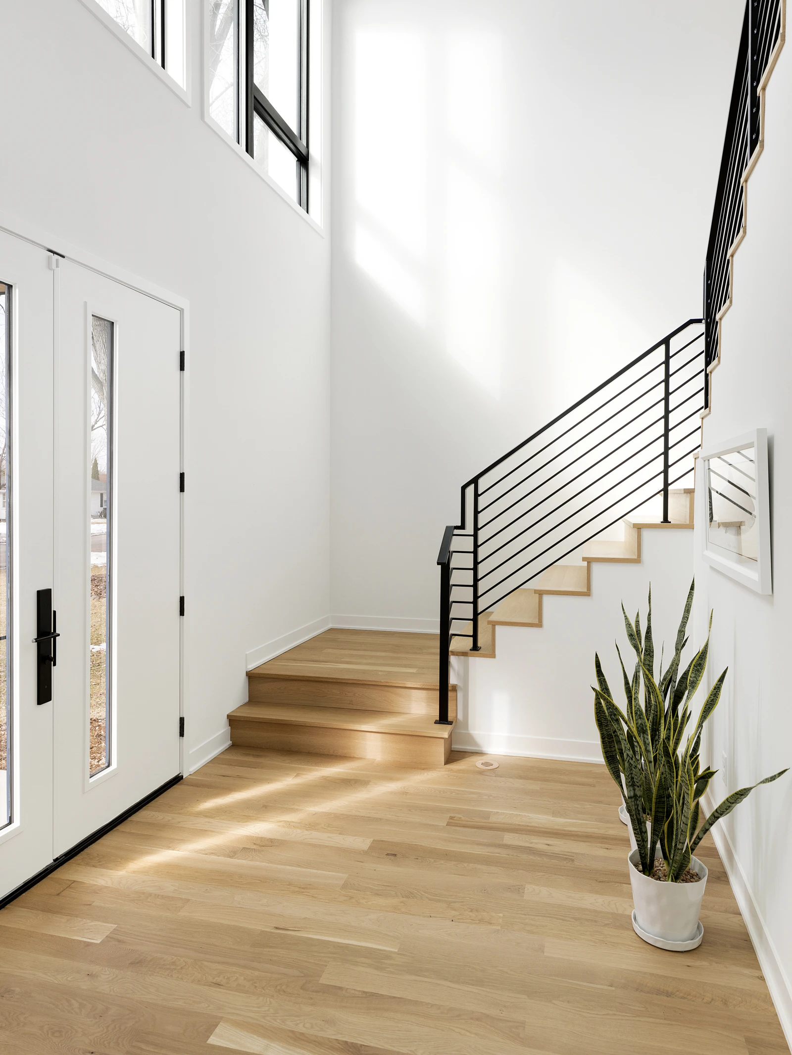 Door entrance leading to a staircase