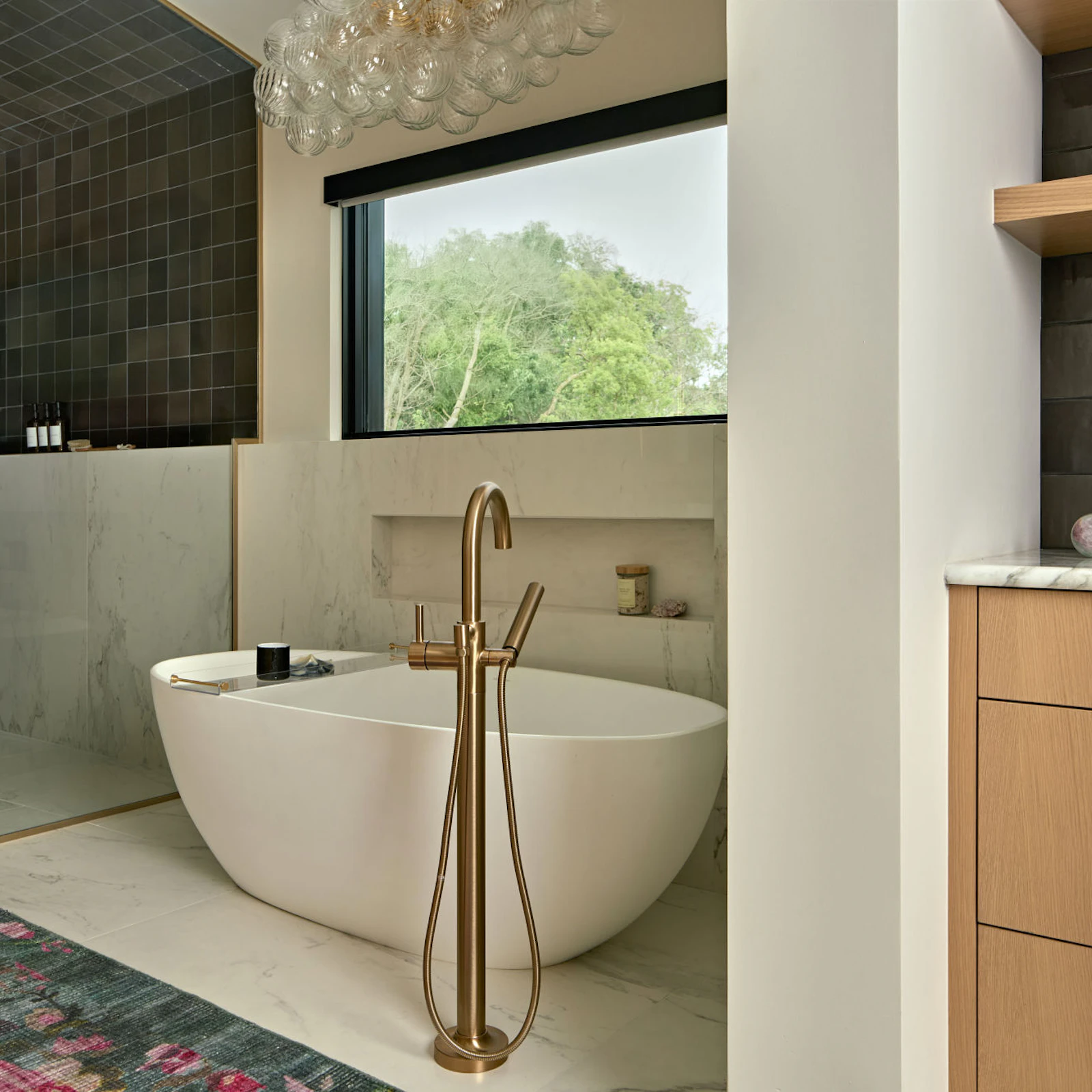 Large tub and shower with natural lighting