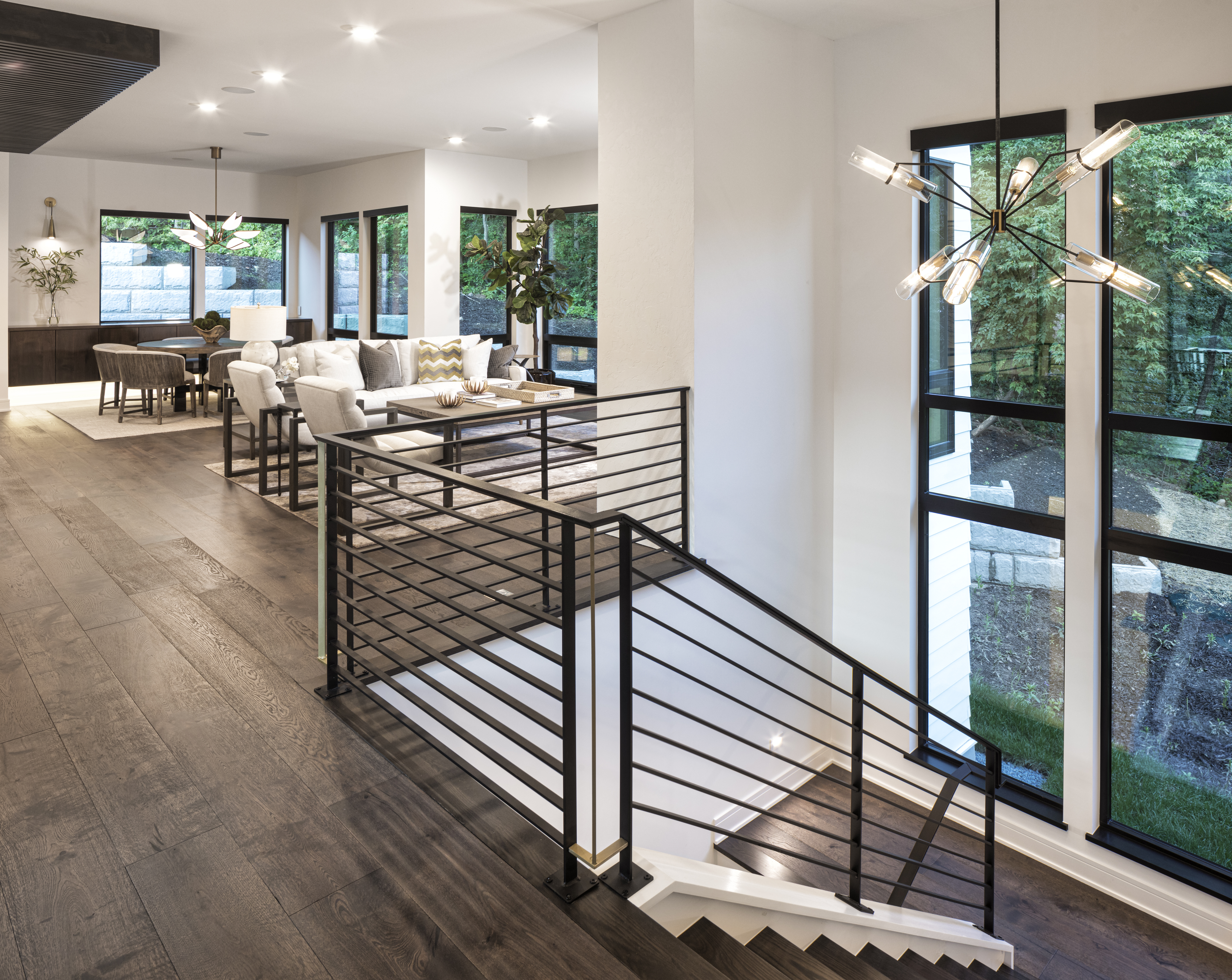 Open floor plan leading down the staircase