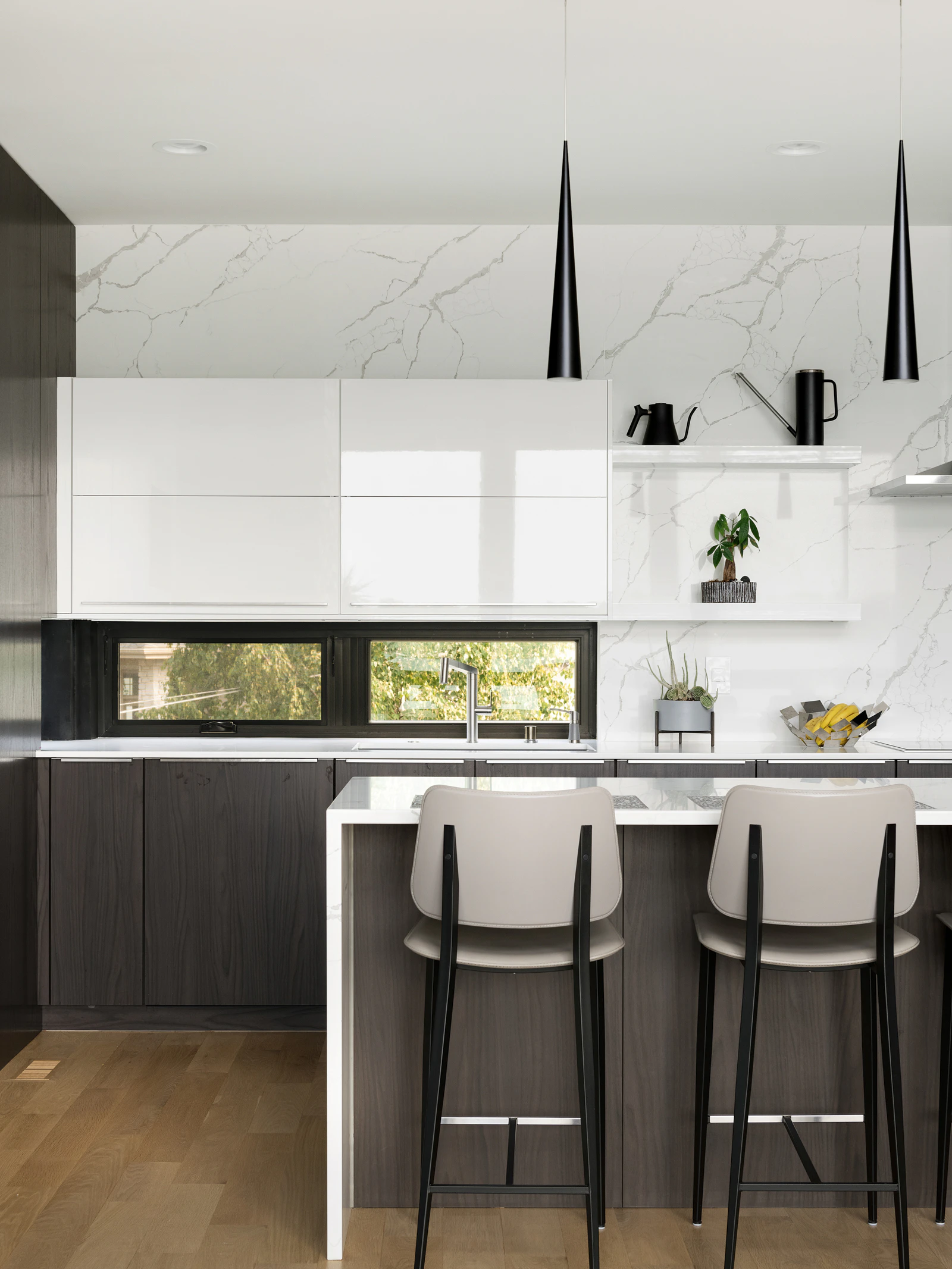 Kitchen with waterfall countertops