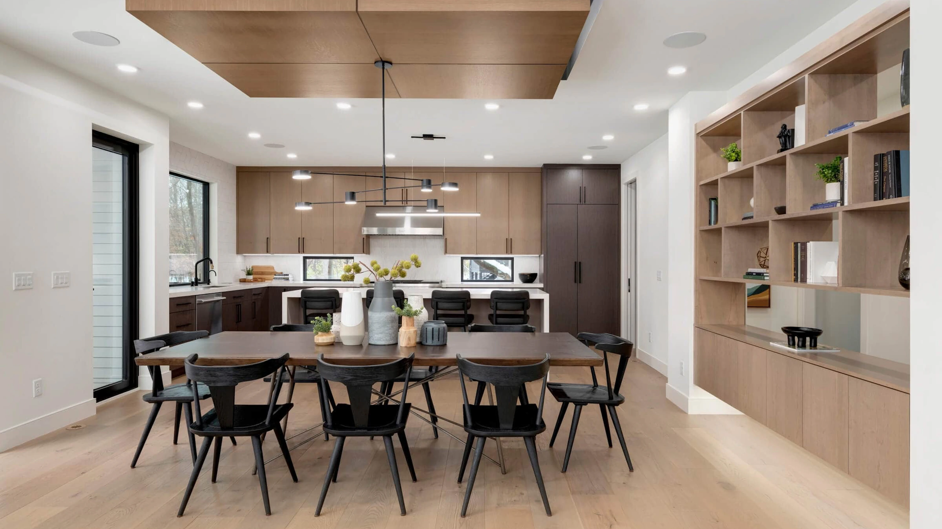 A kitchen with SKS appliances and Cambria countertops