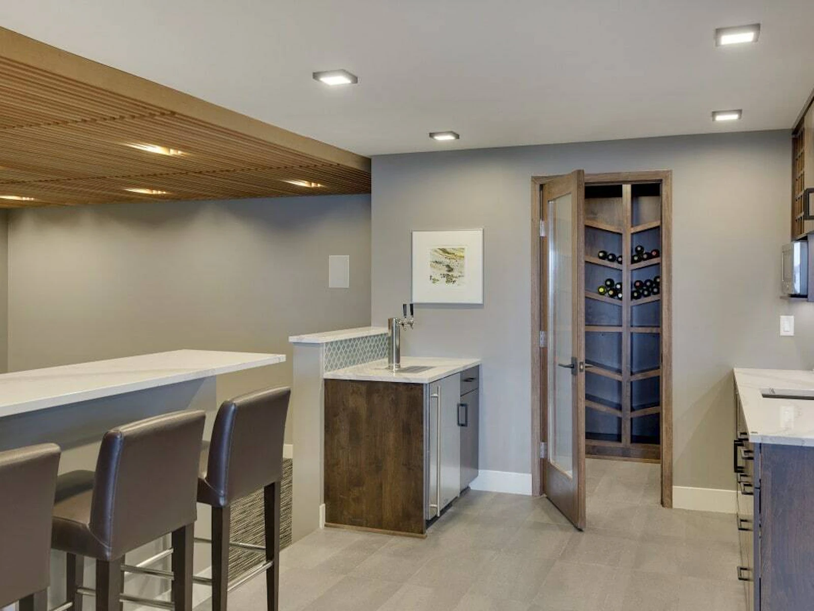 Basement with custom slatted ceiling