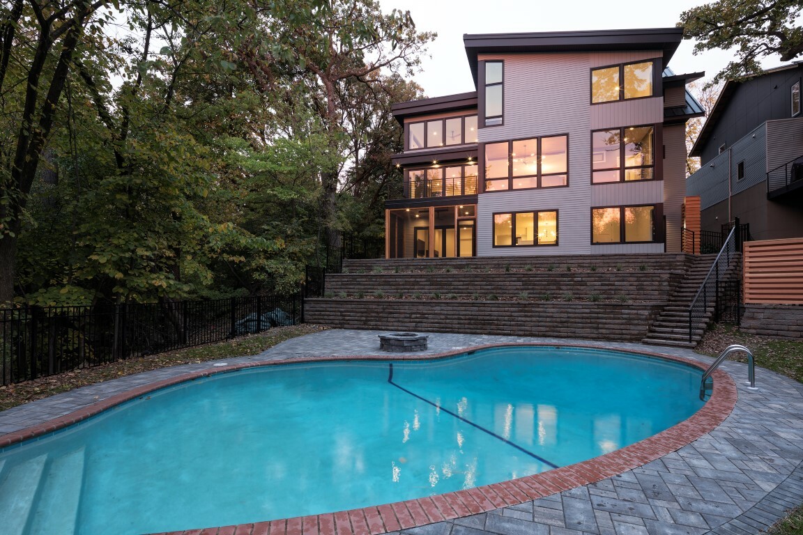 Stunning views of the backyard and pool